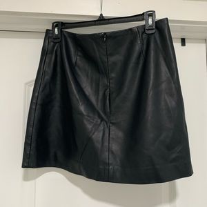 Black leather mini skirt
